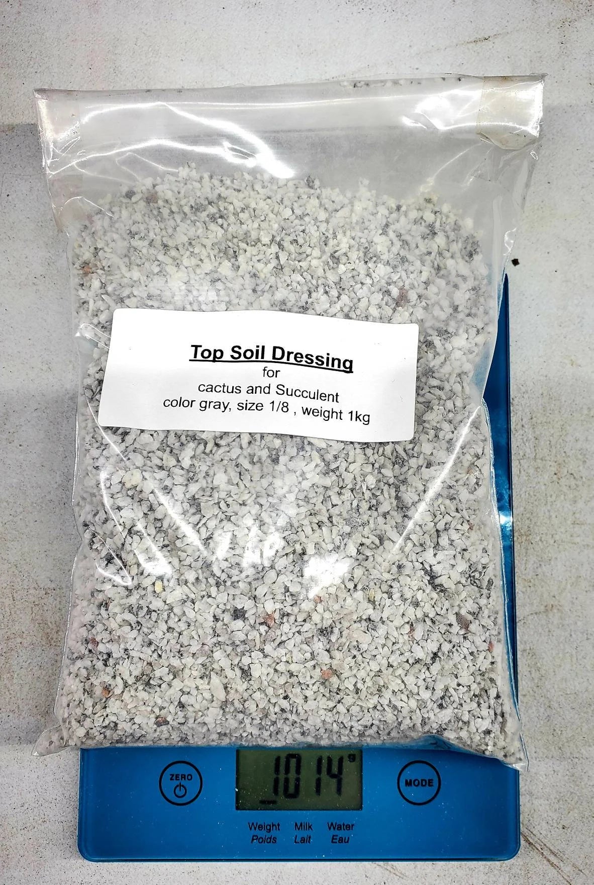 Top soil dressing grey /white 1/8 or 1/4, 1kg